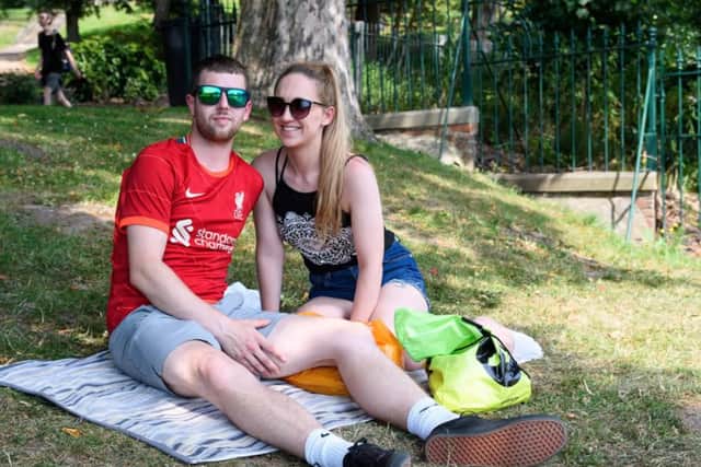 Jordan Tyrer and Natalie Smith enjoying the sun in Avenham Park.