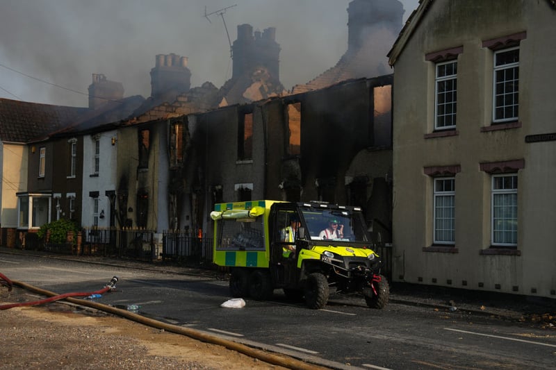 15 fire engines and around 100 firefighters were called to the east London village on Tuesday to tackle the huge blaze where 40 hectares of grassland, farm buildings, houses and garages were destroyed.