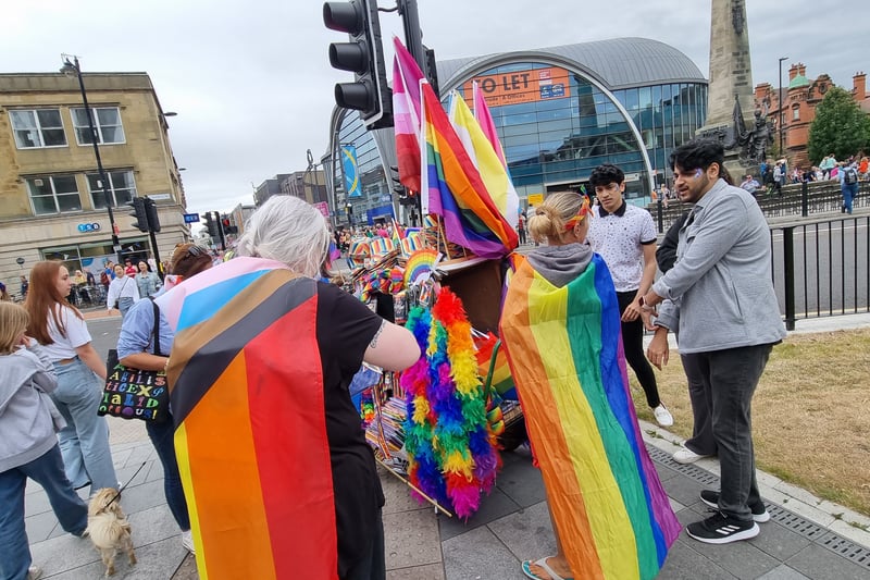 Vendors sell Pride flags by Northumberland Street.