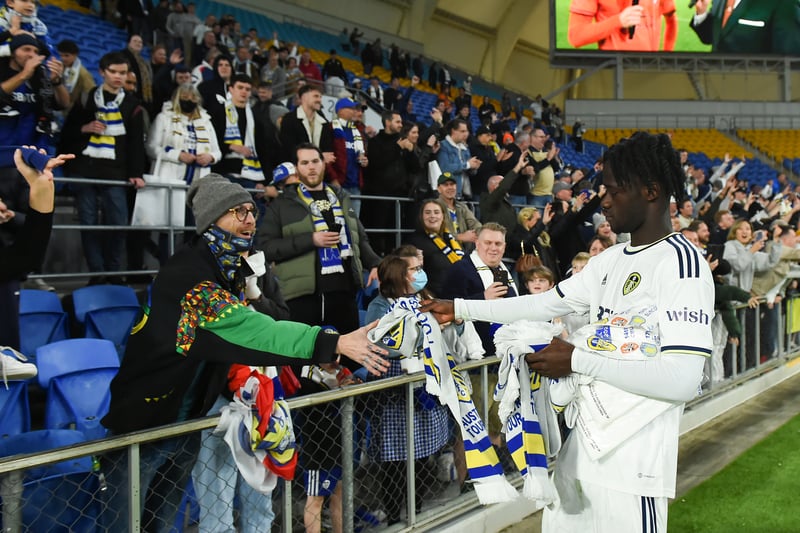 Darko Gyabi of Leeds United hands out merchandise to Leeds United fans during the 2022 Queensland Champions Cup match between Brisbane Roar and Leeds United (Photo by Albert Perez/Getty Images)