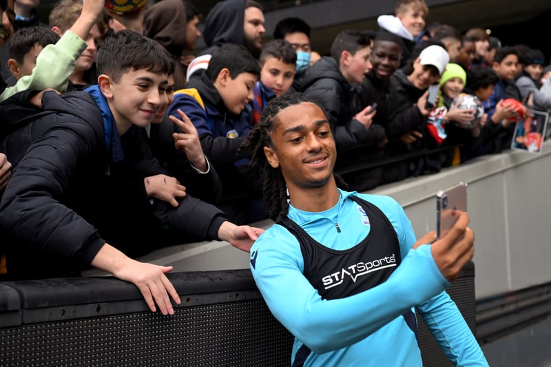 Crystal Palace’s Jadan Raymond takes a selfie with fans during a training session in Melbourne.