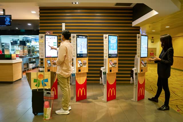 Stickers can also be redeemed via the touchscreen kiosks (Adobe)