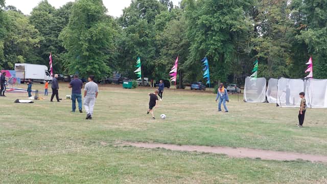 Children play football at the park 