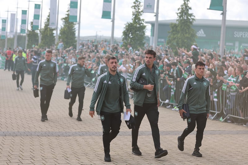 The Hoops squad receive a warm welcome from fans as they arrive for their match against Aberdeen.