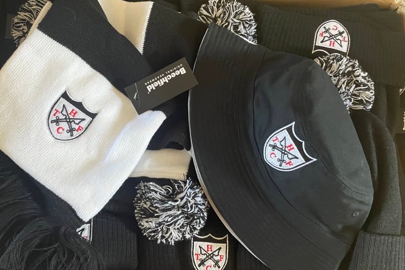 Given the black and white colours, Newcastle United fans love making purchases from the Hanwell Town club shop. As well as the kit, there are Brown Ale t-shirts, hats, beanies, badges, face coverings and more.
