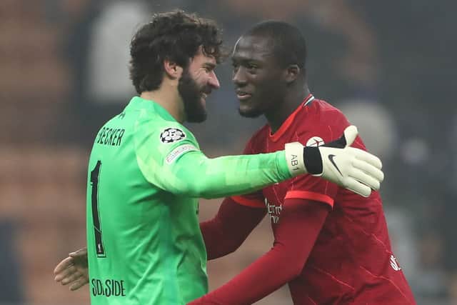 Alisson Becker and Ibou Konate. Picture: Marco Luzzani/Getty Images