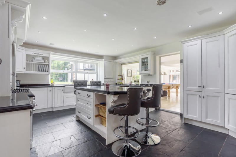 The bright and airy kitchen is an ideal family space