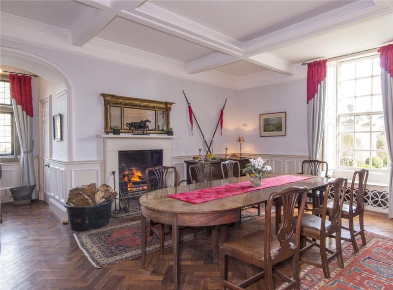 The dining room has an open fire place and access to a separate study.