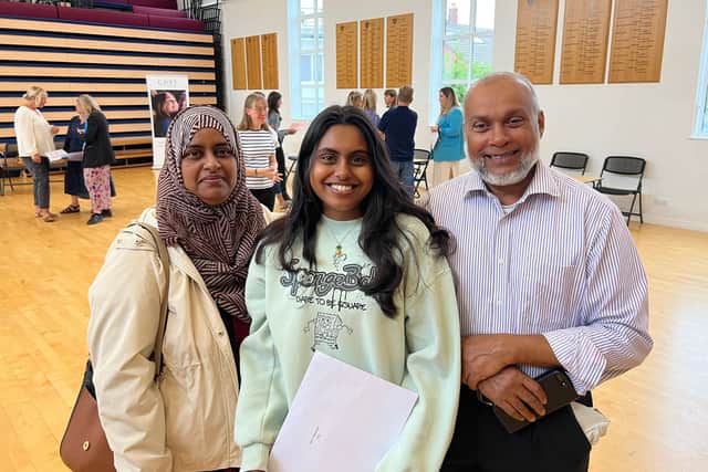 Busrat (l) and Malik Busrat (r) are celebrating her daughter Ilmi’s GCSE achievements at Portsmouth High School. Picture: Richard Lemmer.