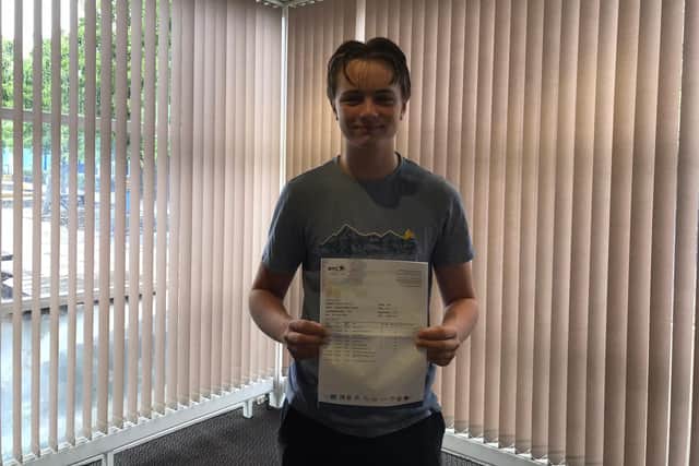 Mathew Fleming with his results at Horndean Technology College. Picture: Sophie Lewis.