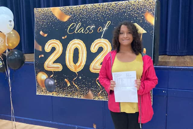 Sophia Reid, 16, achieved four grade 9s in biology, chemistry, geography and design and technology, with six other grades including two grade 8s. She is pictured getting her results at Portsmouth Academy. Picture: Steve Deeks.
