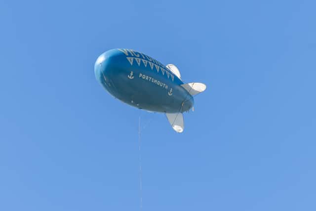 Eye in the sky: the familiar blimp high over the Victorious Festival site. Picture: Mike Cooter (240822).