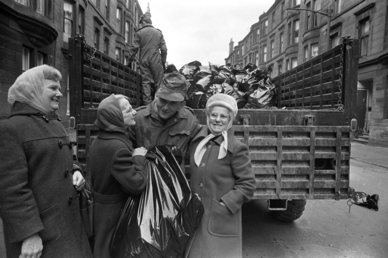 Women thanking the Army who were were roped in to clear the rubbish from the streets of Glasgow after a cleansing department strike in March 1975.