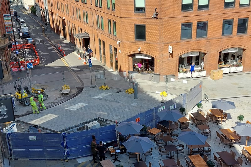 Some resurfacing work continues on the corner of Albert Square near Lloyd St and Jackson’s Row, but restaurants have resumed outdoor seating.  Credit: Sofia Fedeczko/Manchester World