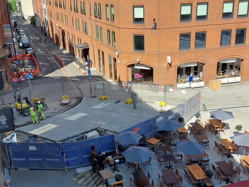 Some resurfacing work continues on the corner of Albert Square near Lloyd St and Jackson’s Row, but restaurants have resumed outdoor seating. Credit: Sofia Fedeczko/Manchester World
