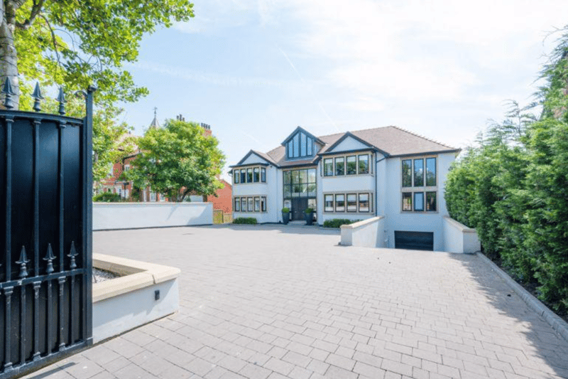 The stunning five-bed detached property has six bathrooms, an impressive driveway and a modern finish throughout.