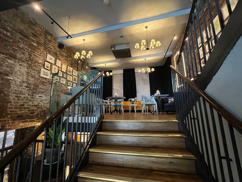 Drinks can be enjoyed in a plush lounge area bathed in natural light.