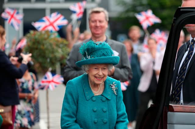 Her Majesty the Queen is greeting by flags as she arrives in Manchester in July 2021 
All photos: Getty