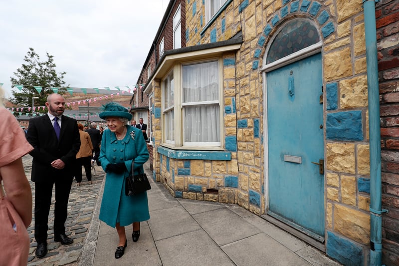 The Queen takes a look round Manchester’s most famous ‘street’