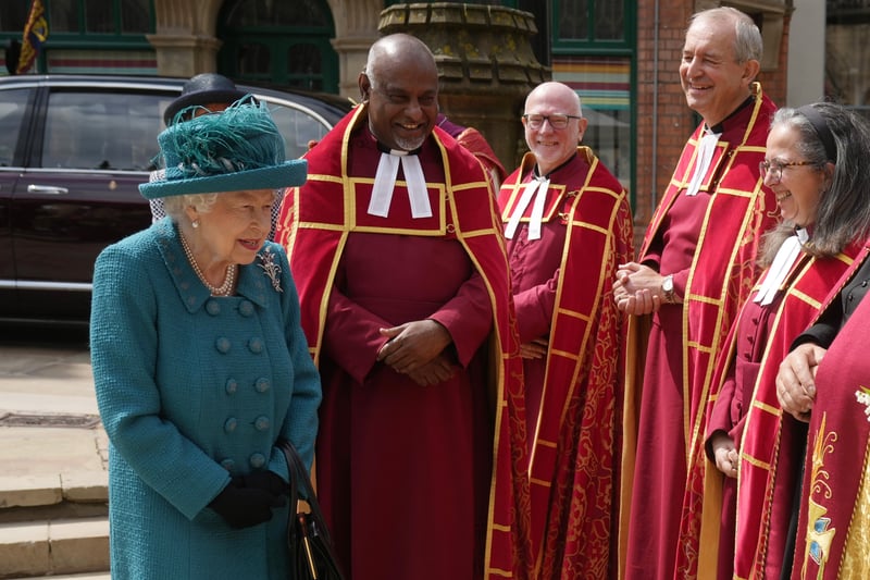Queen Elizabeth II is introduced to members of the clergy by Dean of Manchester Cathedral, Rogers Govender