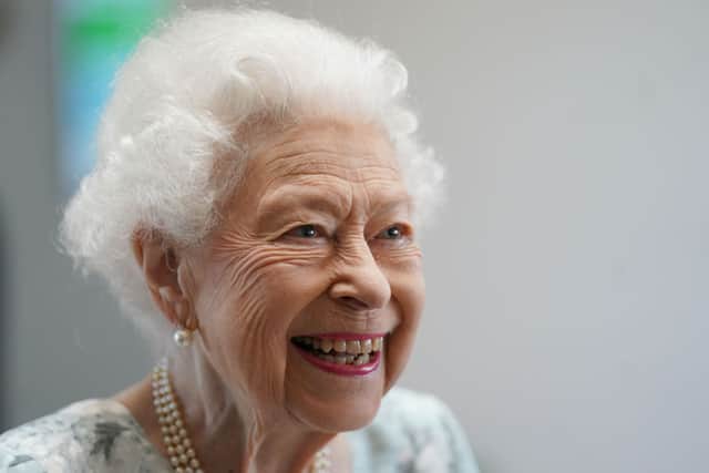 Queen Elizabeth II smiles during a visit to officially open the new building at Thames Hospice in July 2022. Picture: Getty Images.