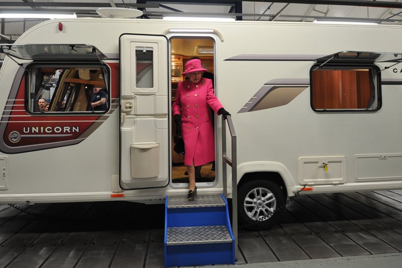 The Queen steps out of a caravan during a visit to the Bailey caravan factory also as part of her Jubilee tour on November 22, 2012.