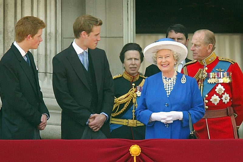 Prince Harry (L), Prince William (2L), Princess Anne (3L) and the Duke of Edinburgh (R) look on after attending the Trooping of the Colour ceremony June 14, 2003. Credit: Scott Barbour/Getty Images