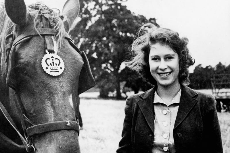 Princess Elizabeth, the future Queen Elizabeth II, at Sandringham with one of the horses. Credit: AFP via Getty Images