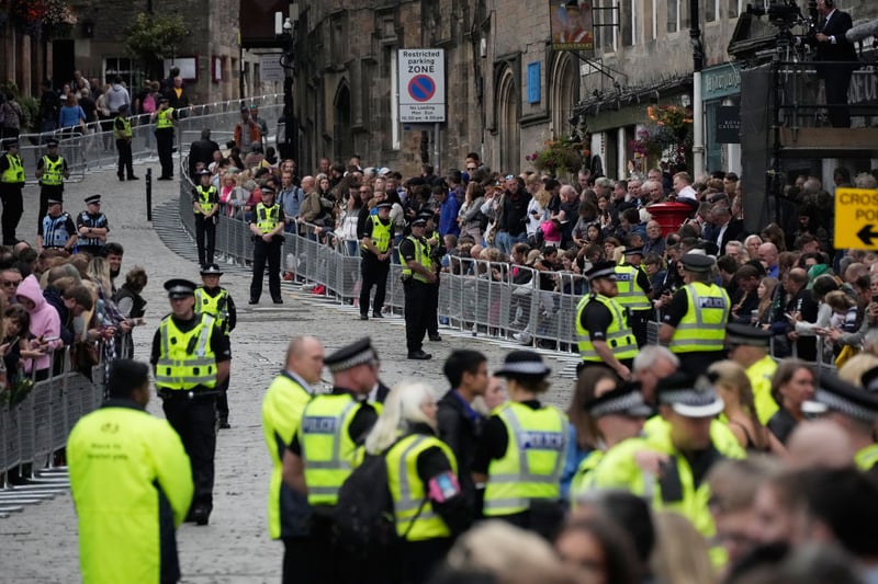 Police presence in Edinburgh grows as the public wait for the cortege carrying the coffin of Queen Elizabeth II to arrive
