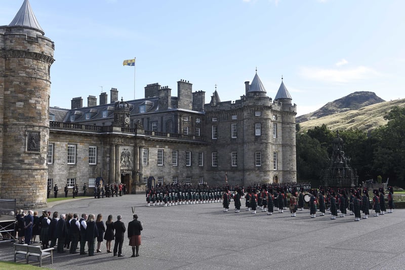 King Charles III and the Queen Consort with Edinburgh Lord Provost Robert Aldridge inspect the guard of honour at the Ceremony of the Keys at the Palace of Holyroodhouse.