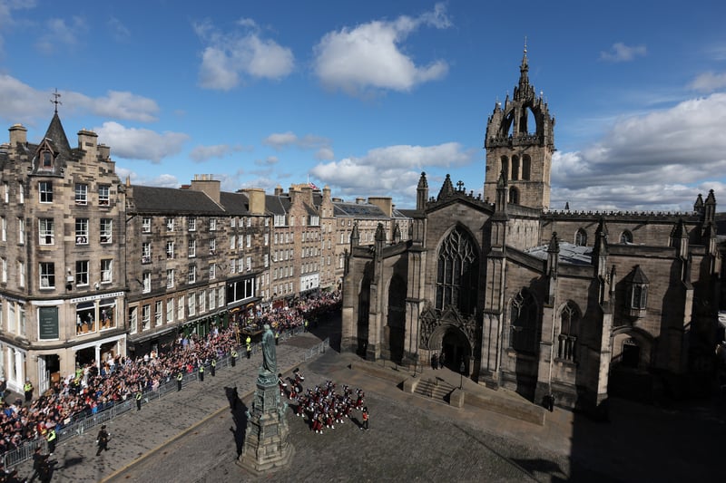 Members of a band march outside St Giles’ Cathedral, Edinburgh, ahead of a Service of Prayer and Reflection for the Life of Queen Elizabeth II.