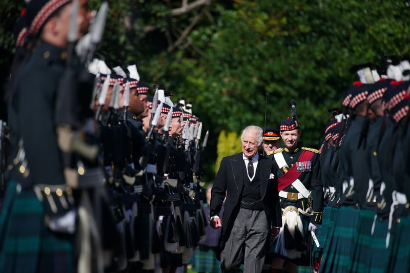 King Charles III inspects the Guard of Honour as he arrives for the Ceremony of the Keys at the Palace of Holyroodhouse.