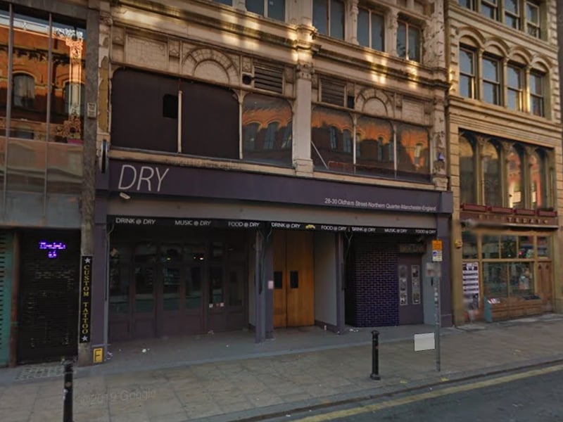 Dry Bar on Oldham St closed in 2017 and has yet to be replaced. It was founded in 1989 by Factory Records and welcomed some of the city's most-loved music icons, including Oasis and Happy Mondays, through its doors. Credit: Google Street View