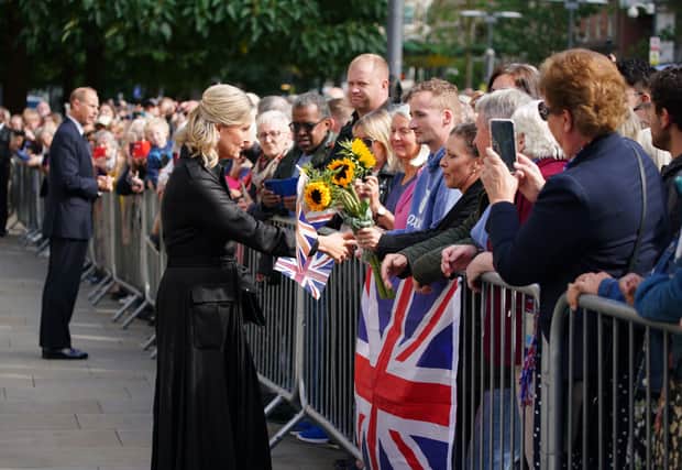 The Earl and Countess of Wessex meeting members of the public outside Manchester’s Central Library Credit: PA