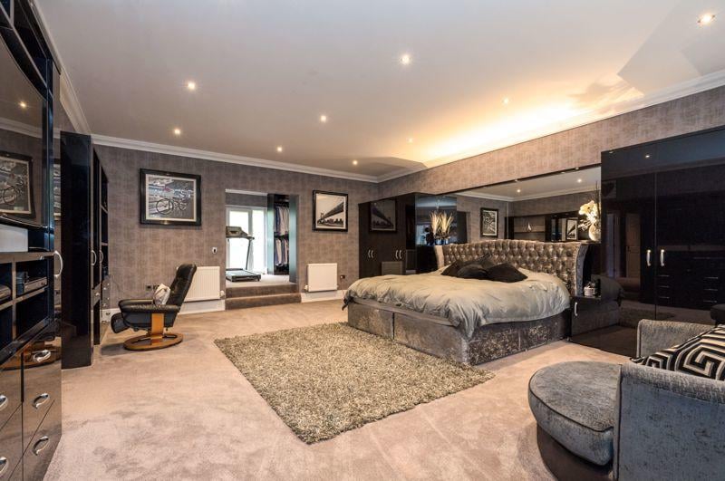 The enormous, modern master bedroom