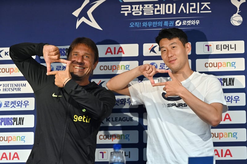 The boss poses with Son Heung-min during pre-season. 