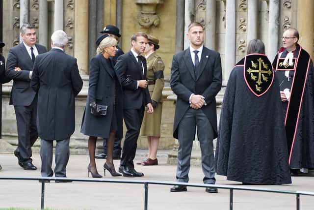 French President Emanuel Macron (fourth left) and wife Brigitte Trogneux arrive at the State Funeral of Queen Elizabeth II, held at Westminster Abbey, London.Picture date: Monday September 19, 2022.