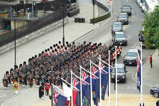 Vehicles in the motorcade of US President Joe Biden and First Lady Jill Biden approach Parliament Square in London, ahead of the State Funeral of Queen Elizabeth II, held at Westminster Abbey. Picture: PA.