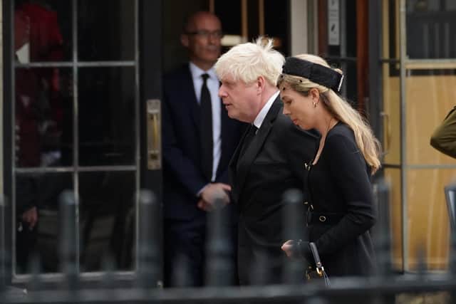 Former Prime Minister Boris Johnson and wife Carrie arrive at the State Funeral of Queen Elizabeth II, held at Westminster Abbey, London.Picture date: Monday September 19, 2022.