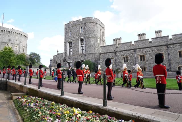 Standing to attention at St George’s Chapel, Windsor Castle. Picture: PA.