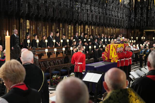 The coffin of Queen Elizabeth II is carried into St George’s Chapel in Windsor Castle. Picture: PA.