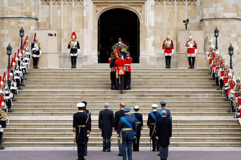 Pall bearers carry the coffin of Queen Elizabeth II with the Imperial State Crown resting on top into St George’s Chapel ahead of her children and grandchildren. Credit: Getty