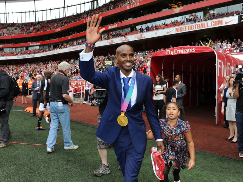 The former Team GB star showing off his gold medal at the Emirates Stadium. 