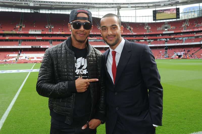 The F1 driver is a Gunners fan and is pictured here with ex-player Theo Walcott. 