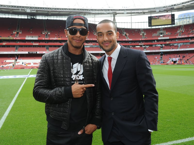 The F1 driver is a Gunners fan and is pictured here with ex-player Theo Walcott.