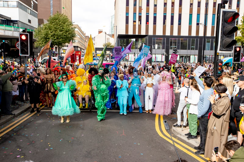 A dance troupe leads the Birmingham Pride Parade for the first time ever on its 25th anniversary