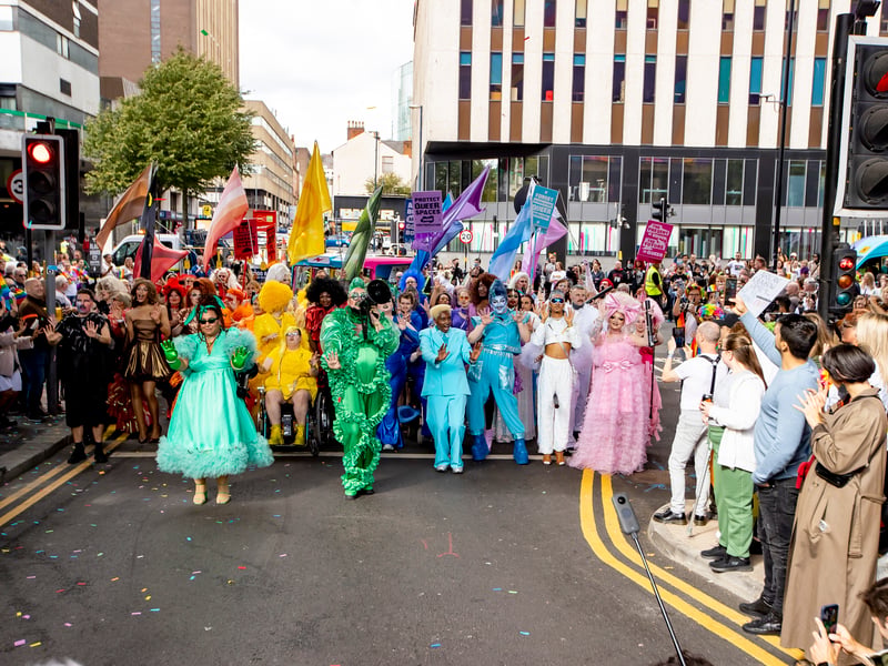 A dance troupe leads the Birmingham Pride Parade for the first time ever on its 25th anniversary