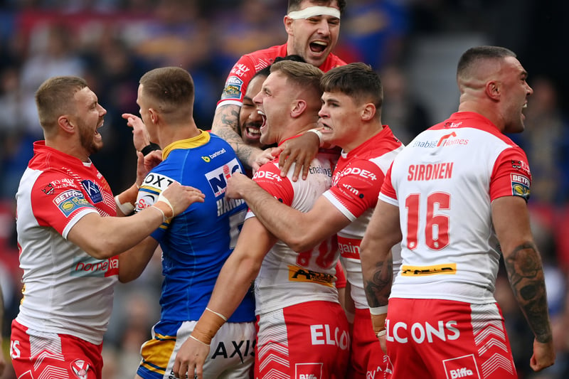 Matty Lees of St Helens celebrates scoring his side’s first try with teammates. (Photo by Gareth Copley/Getty Images)