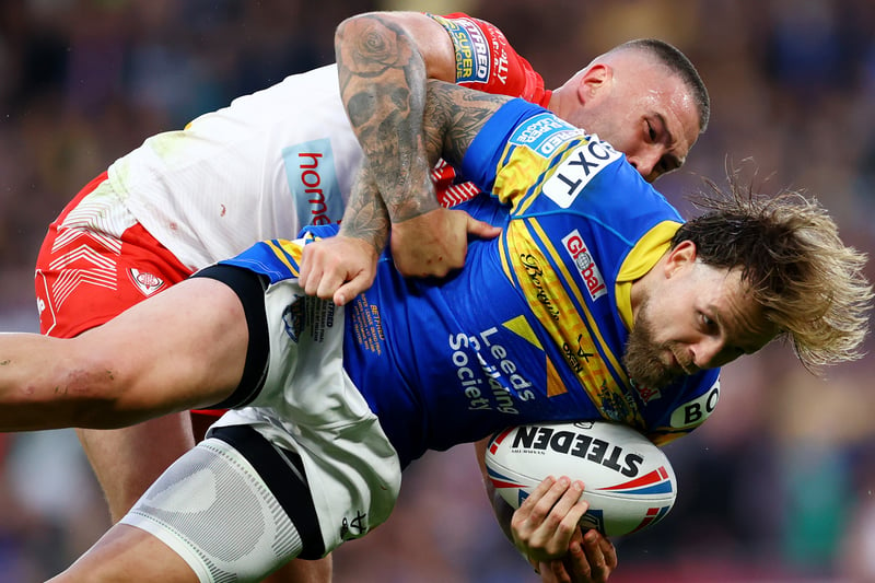 Curtis Sironen of St Helens tackles Blake Austin of Leeds Rhinos. (Photo by Michael Steele/Getty Images)