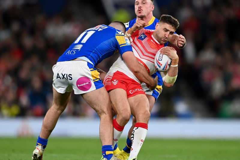 James Bentley of Leeds Rhinos tackles Tommy Makinson of St Helens. (Photo by Gareth Copley/Getty Images)